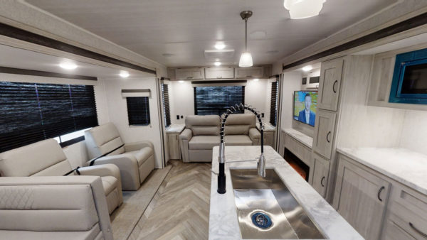 Rear seating and entertainment space inside the 2023 Della Terra 292MK