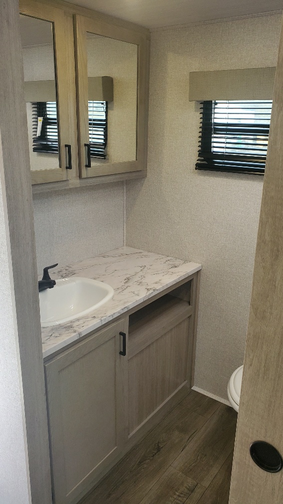 Bathroom vanity inside the 2023 Alta 2600KRB