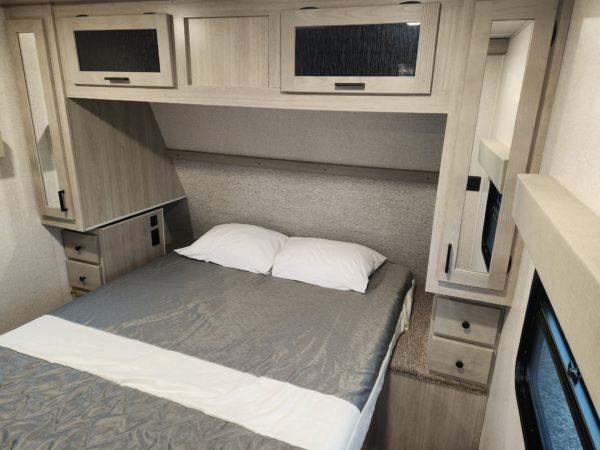 View of overhead storage in the bedroom of the 2023 Alta 2810-KIK
