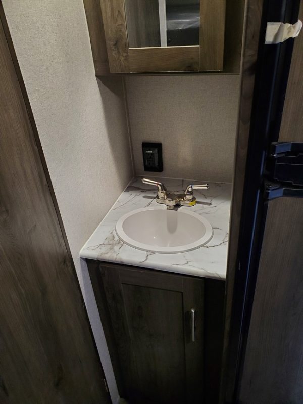 Bathroom sink inside the 2022 Viking 182DBU