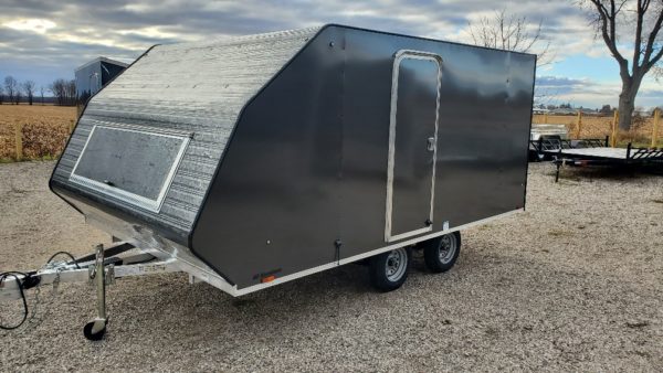View of the exterior of the 2023 Lightning Avalanche 8.5X14 Tandem Axle Aluminum Snowmobile Trailer