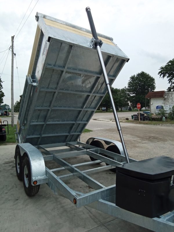 View the of the 2023 Dura Trail 6.5x12 7 Ton Galvanized Dump Trailer fully tipped