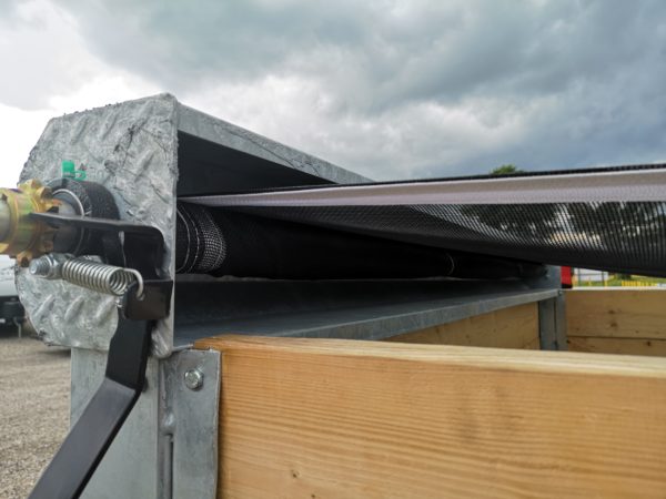 Roll for the mesh on the bed cover system installed on the 2023 Dura Trail 6.5x12 Galvanized Dump